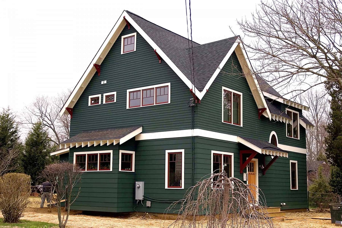 Side view of a custom green home with multiple windows in Annapolis, Maryland by Villa Builders